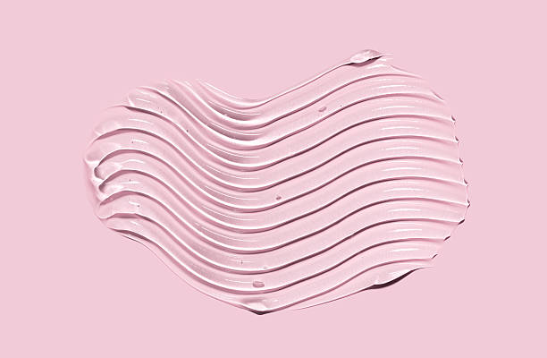 istock cosmetic texture gel essence smear on a pink background 2244801175