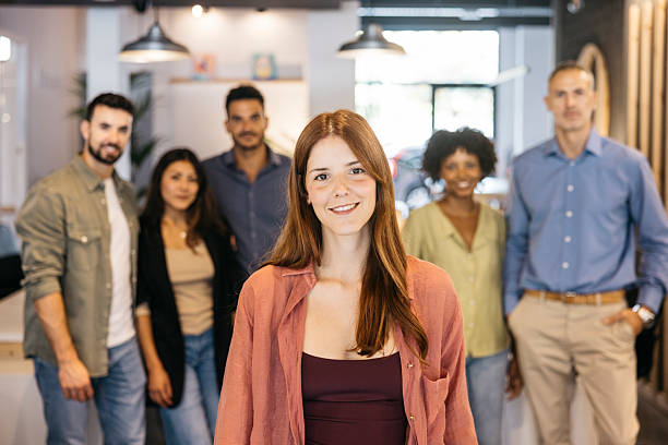istock Successful business team smiling in office environment 2244802927