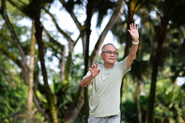 istock An elderly Asian man practicing Tai Chi movement in the garden 2244803926