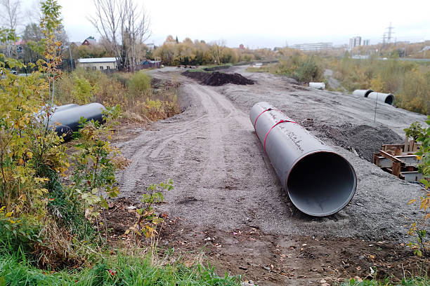 istock Water supply pipes on the ground. Excavation work to replace the pipes. 2244804523