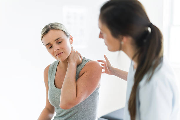 istock Modern rehabilitation physiotherapy clinic with professional and client 2244806436