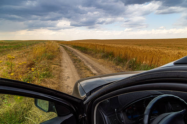 A truck motion blurred driving through rural america