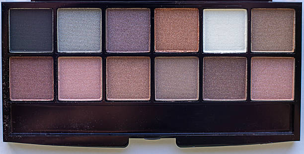 Two-row eyeshadow palette with neutral and warm tones for everyday and dramatic makeup looks
