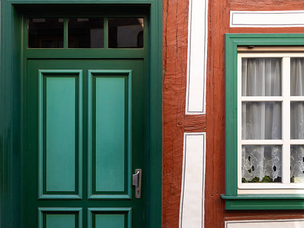 istock Exterior door and window on wood building 2244810216