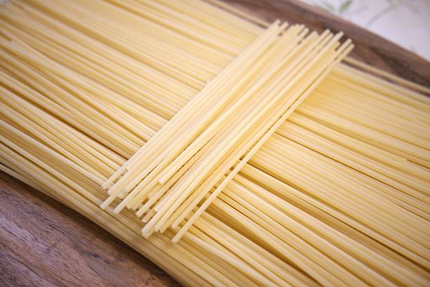istock Raw food spaghetti pasta close-up, Copy Space 2244812572