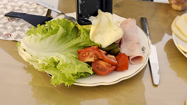 istock Perfectly Melted Raclette Cheese on a Ready-to-Eat Dinner Plate 2244812667