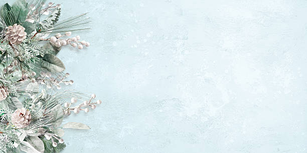 Subtle winter-themed background featuring pinecones and frosted florals arranged on the left side. Christmas and New Year holidays concept