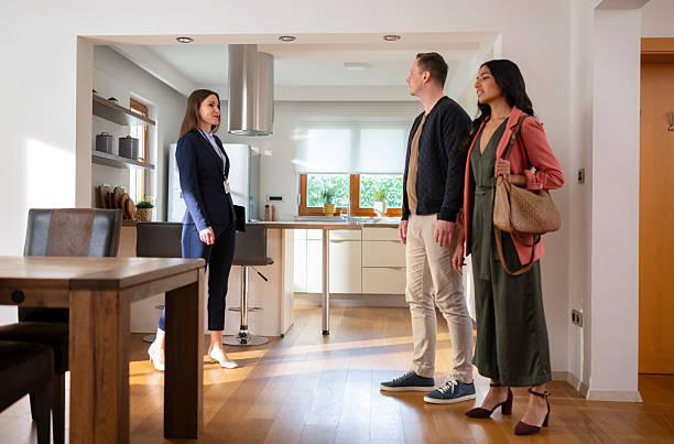 istock Estate Agent Talking With Potential Buyers 2244814266