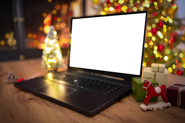 istock Laptop With Blank Screen And Christmas Decorations 2244814536