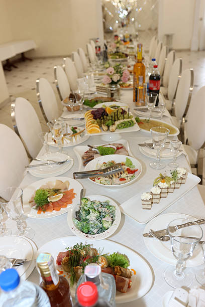 istock Festive table with various dishes, salads, meat and fish. 2244818534