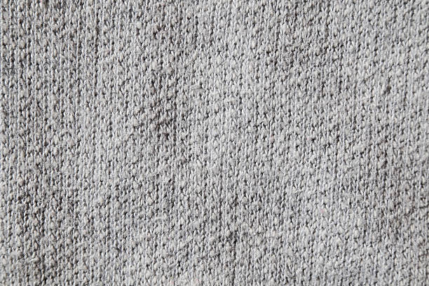 Grey knitted fabric texture background with copy space