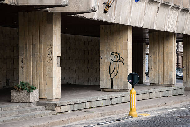Vilnius, Lithuania - July 01, 2015 - Urban architecture with graffiti on concrete pillars in cityscape.