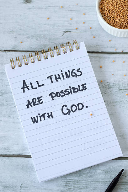 istock All things are possible with God, handwritten quote in a notebook with mustard seeds 2244844459