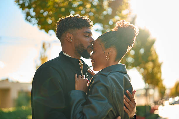 istock Affectionate black couple sharing tender moment outdoors 2244844538