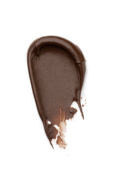 istock A smear of chocolate on a white isolated background, macro photo 2244848492