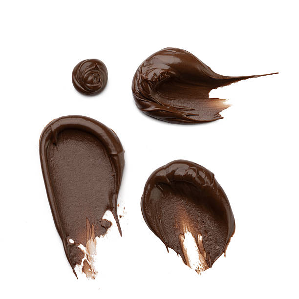 istock smears of chocolate paste on a white isolated background 2244849136