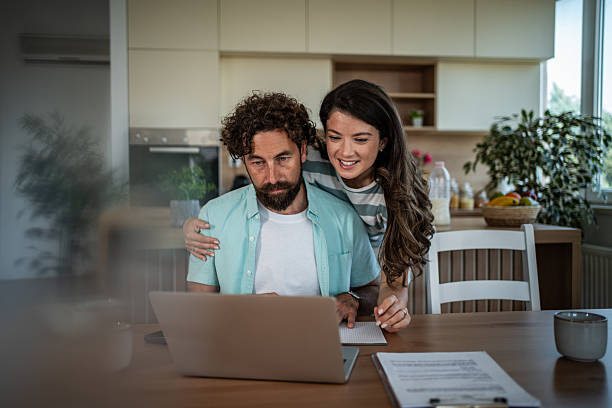 istock Couple planning home budget finances using laptop 2244852372