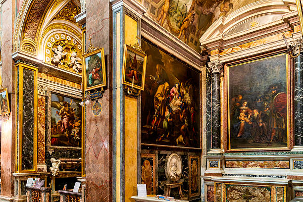 Right side chapels with Nativity and Adoration scenes in Santa Maria del Suffragio, Rome, Italy.