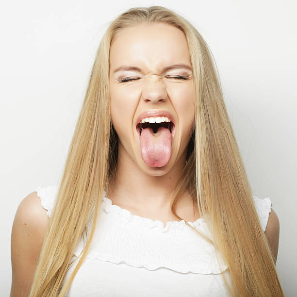 istock frustrated and angry woman screaming. 2244854083