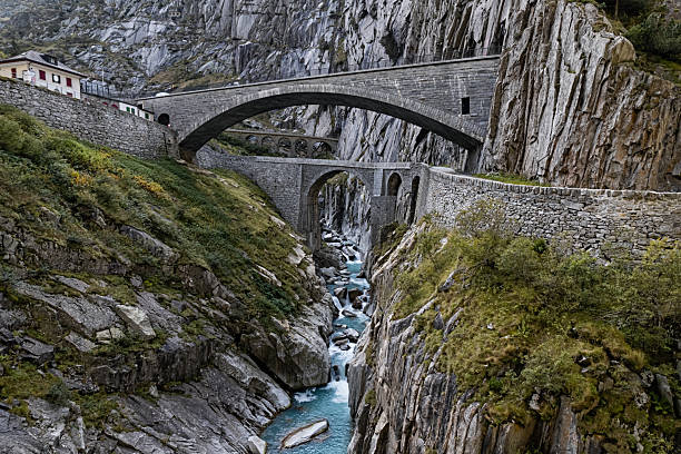 istock Devil's Bridge (Teufelsbrucke) over of Schollenen Gorge (Schollenenschlucht) in Andermatt, Switzerland 2244854690