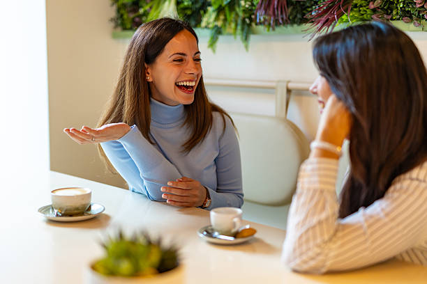 istock two women are saying something very funny 2244855055