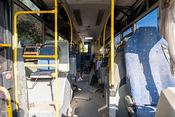 Necochea, Buenos Aires, Argentina. February 13, 2021. Interior of an empty bus in Necochea, photographed from the back, with the driver at the wheel