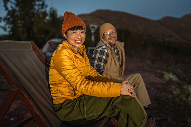 istock Couple relaxing during a camping trip in mountains 2244858217