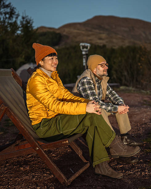 istock Couple relaxing during a camping trip in mountains 2244858231