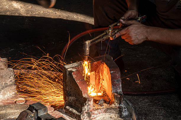 istock Hands of industrial worker using oxy-fuel torch to cut metal. 2244858520