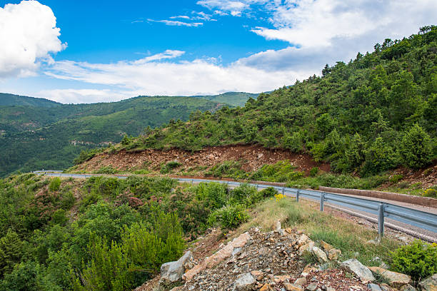 Winding mountain road in north Albanian countryside landscape