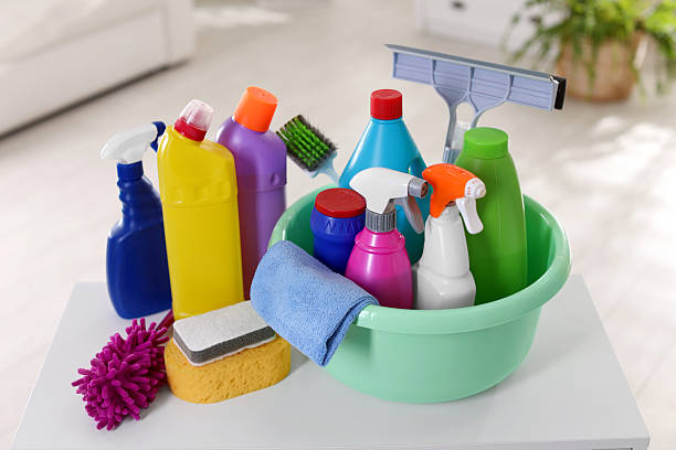 istock Different cleaning products and supplies on white table indoors 2244861381