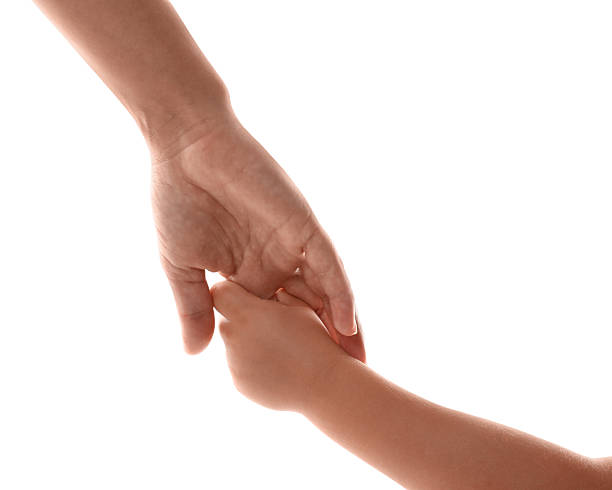 istock Mother and child holding hands on white background, closeup 2244862012