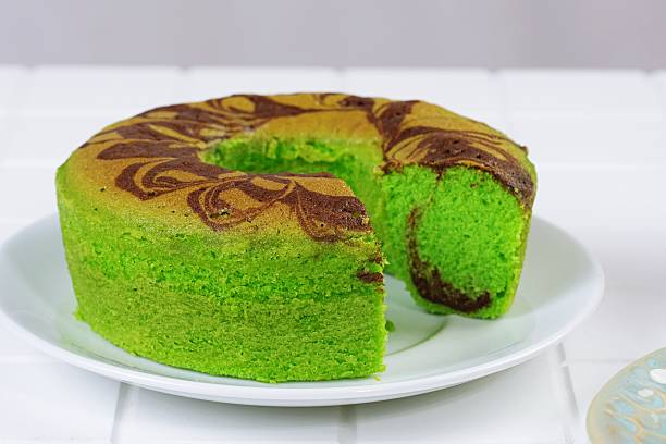 istock Pandan Marble Cake with Slice on White Plate 2244864617