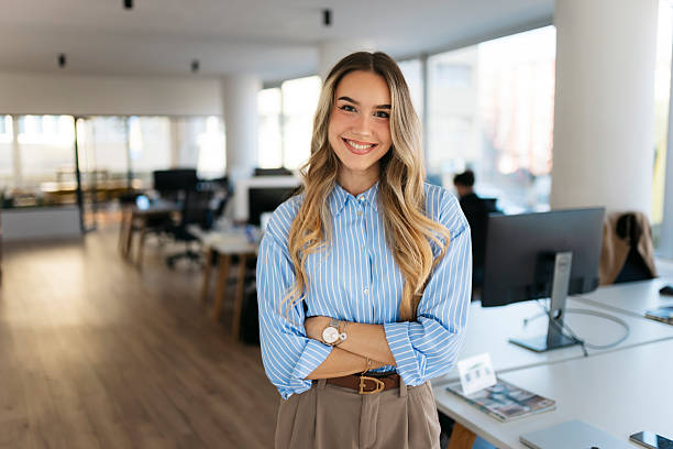 istock Young businesswoman smiling confidently in modern office 2244866130