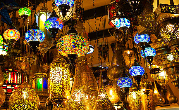 istock Colorful Turkish hanging lanterns in a bustling marketplace showcase exquisite patterns and craftsmanship, creating a warm and inviting atmosphere with rich textures and diffused light. 2244866924