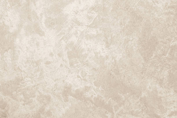 istock Concrete wall texture background. Close up retro plain cream color cement wall background texture. 2244868190