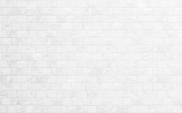 istock Close up modern white brick tiles wall texture background. 2244868191