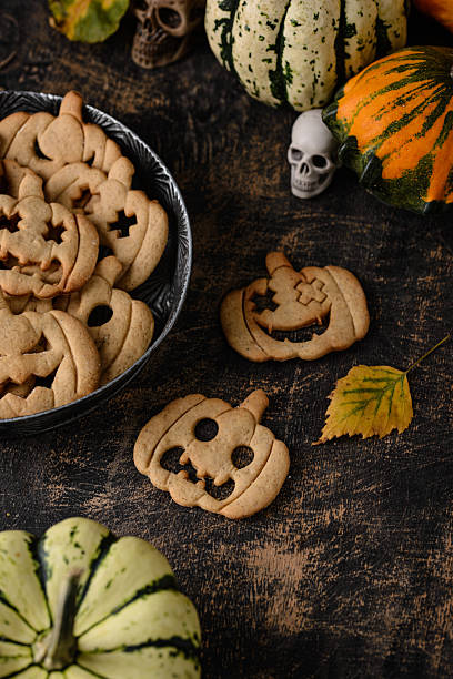 istock Halloween cookies in shape of jack-o-lantern 2244868538