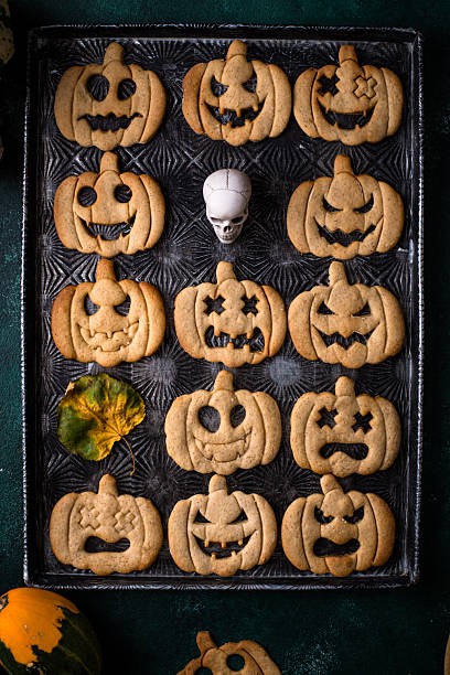 istock Halloween cookies in shape of jack-o-lantern 2244868585
