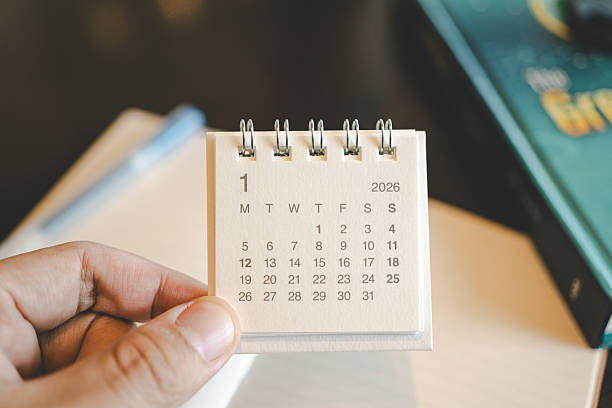 istock Hand Holding Minimal Desk Calendar for January 2026 Planning. 2244874756