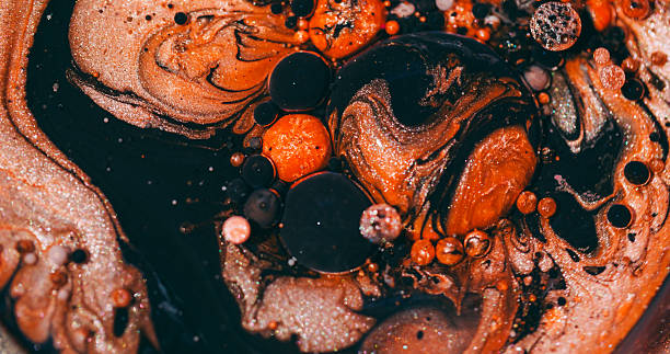 istock Ink stream shiny bubbles glitter acrylic oil water 2244890496