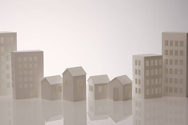 istock Papercraft houses and skyscrapers 2244893659