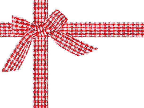 Red and white checkered ribbon with bow crosswise arranged isolated on white background with clipping path. Holiday Sale Concept. Design element.