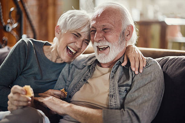 istock Cheerful senior couple having fun while laughing at home. 2244905791