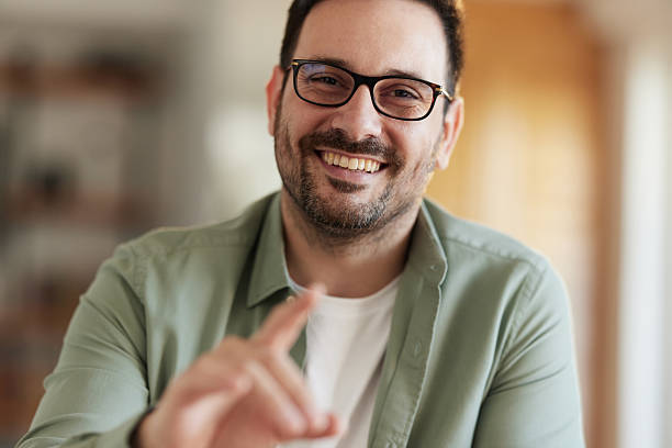 istock Happy man talking during a video call from home. 2244906954
