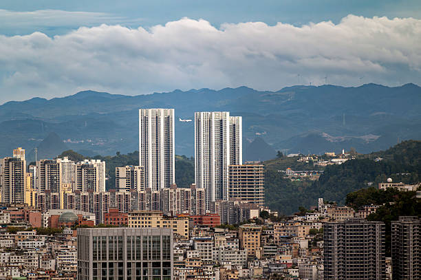istock Modern Guiyang Skyline with Airplane and Mountain Background 2244907294
