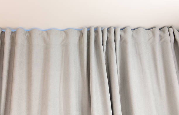 istock A curtain is hanging from a rod 2244907661