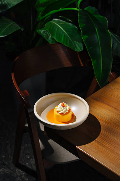 istock Delicious dessert on a table in a cozy cafe surrounded by greenery 2244908619