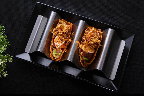 Tortilla Wraps with meat and avocado a Mexican cuisine appetizer