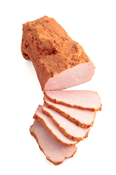 istock Smoked ham isolated on a white background. 2244915274
